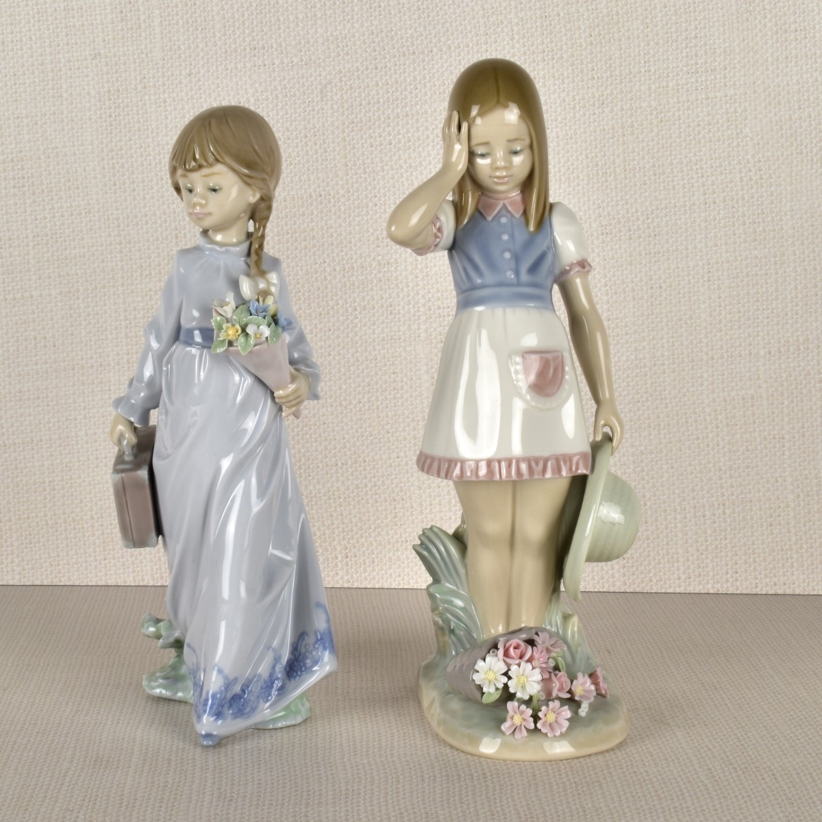 Two Lladro Porcelain Girls with Flowers
