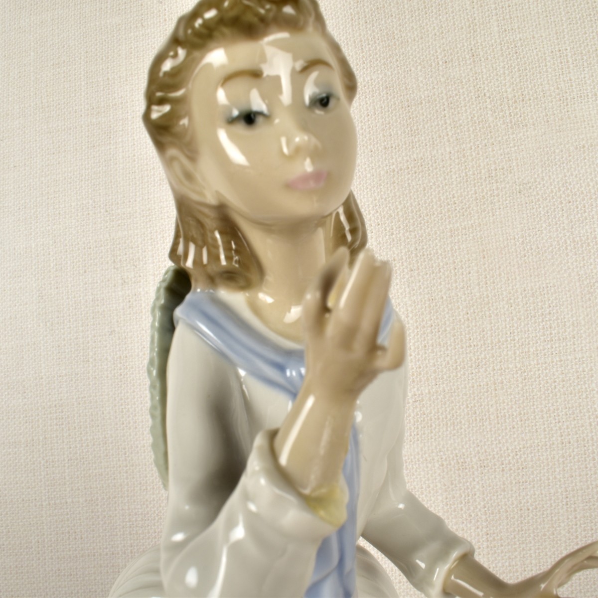 Lladro Figurine of a Girl with Flowers