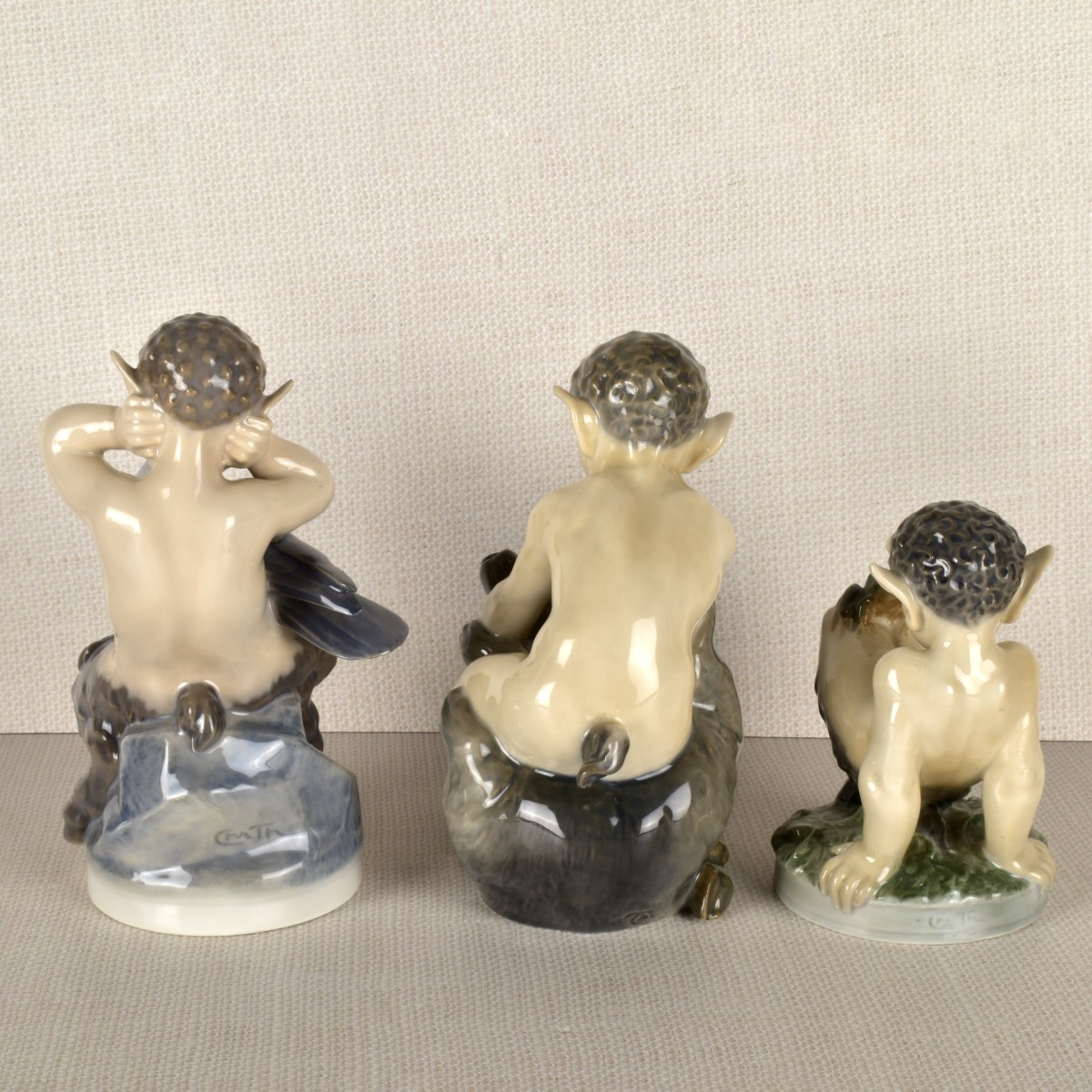 Three Royal Copenhagen Satyr / Pan Figurines
