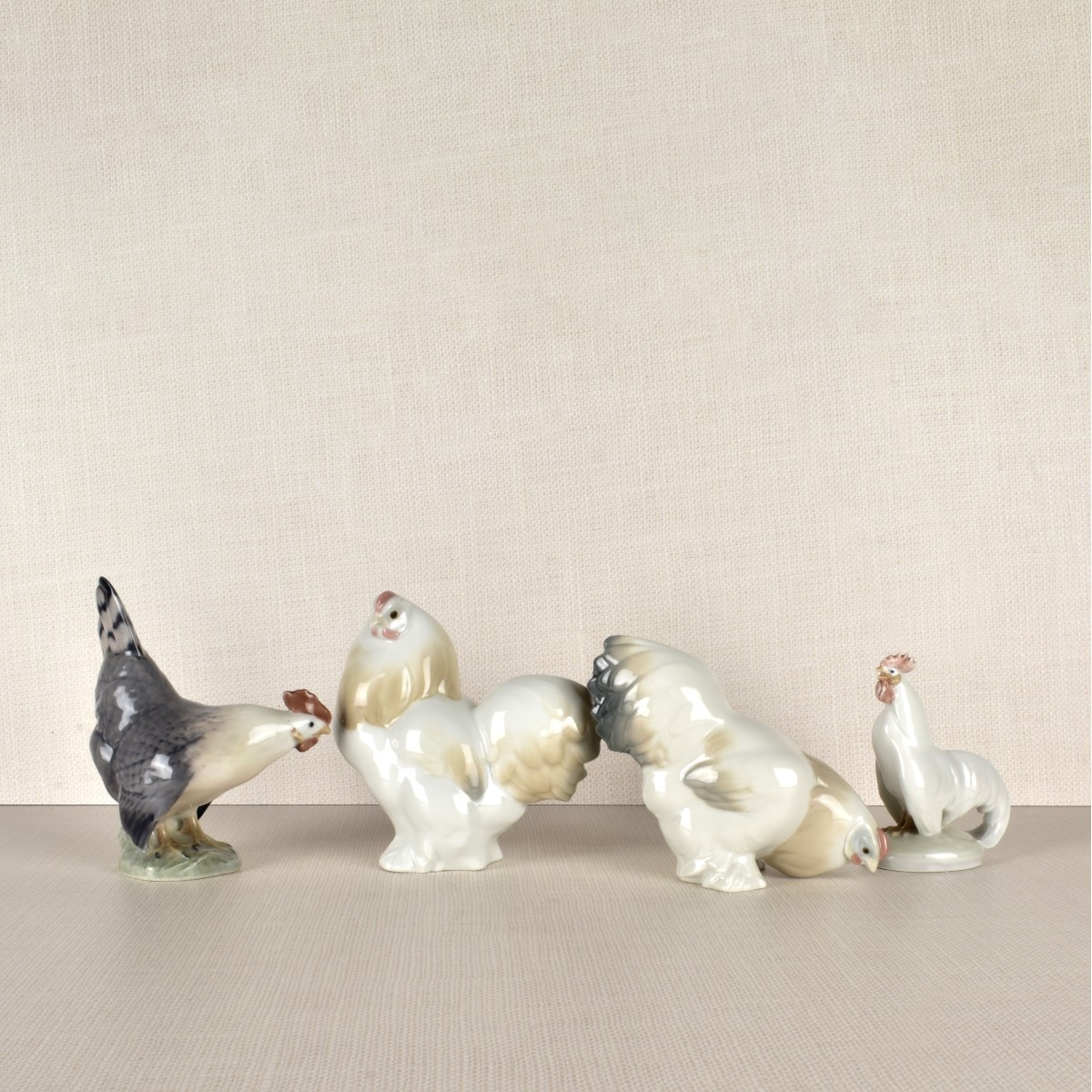 Four Porcelain Barnyard Figurines