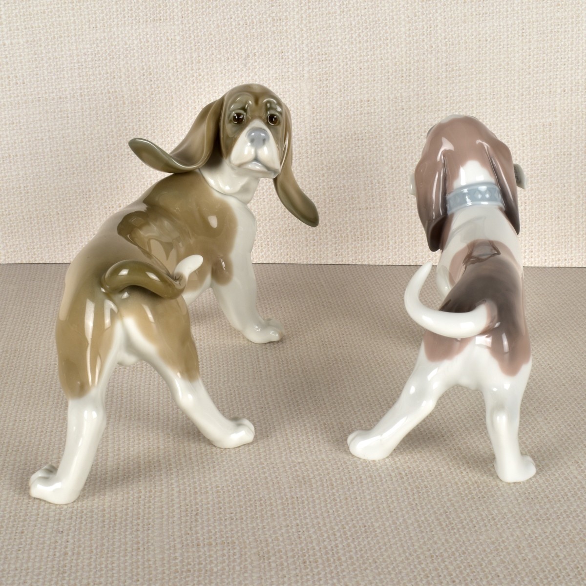 Two Lladro Porcelain Basset Hound Figurines