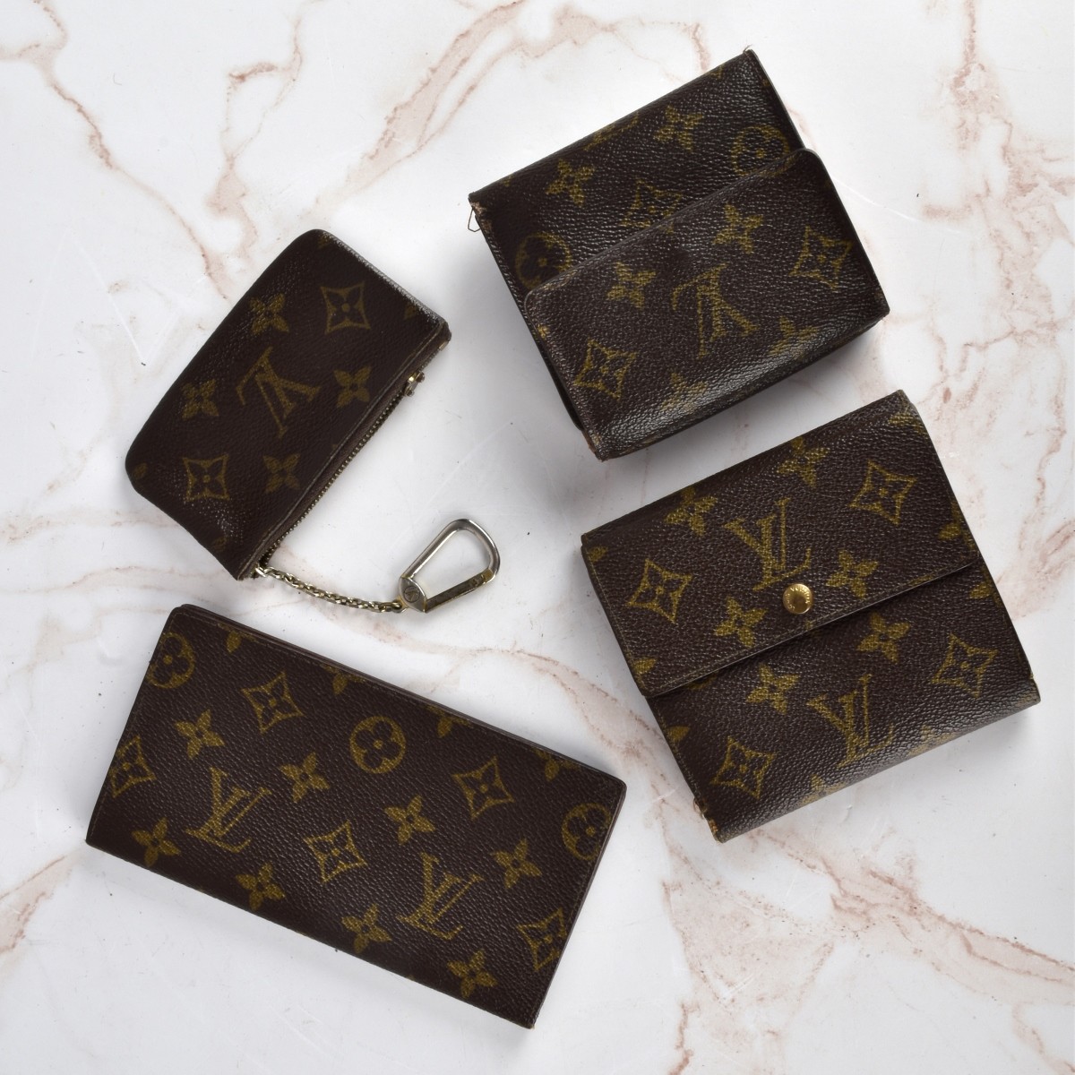 Four Louis Vuitton Monogram Accessories