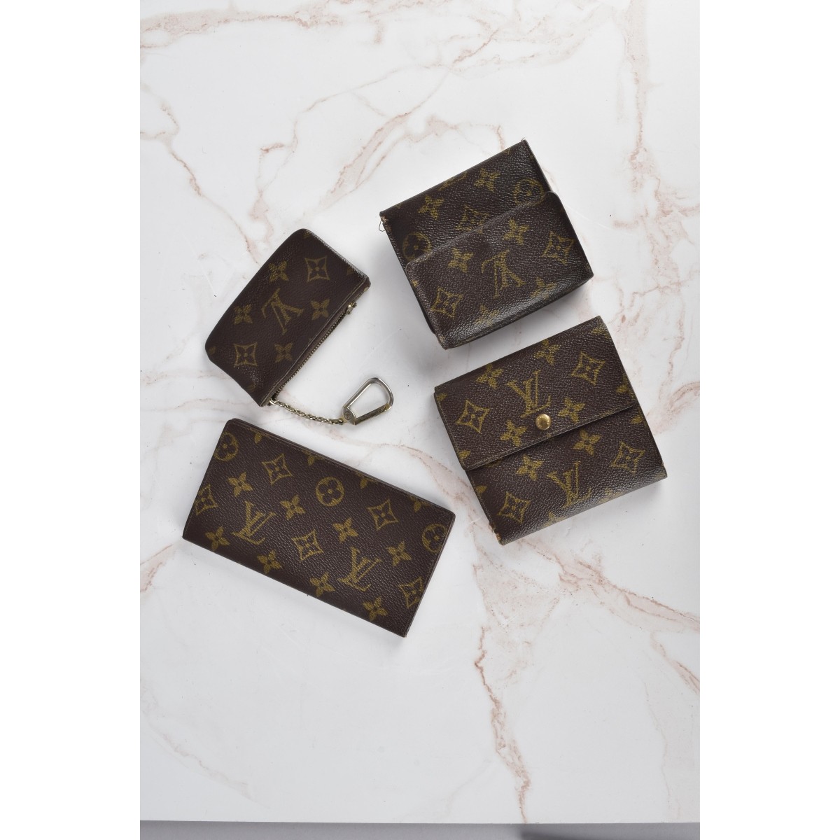 Four Louis Vuitton Monogram Accessories