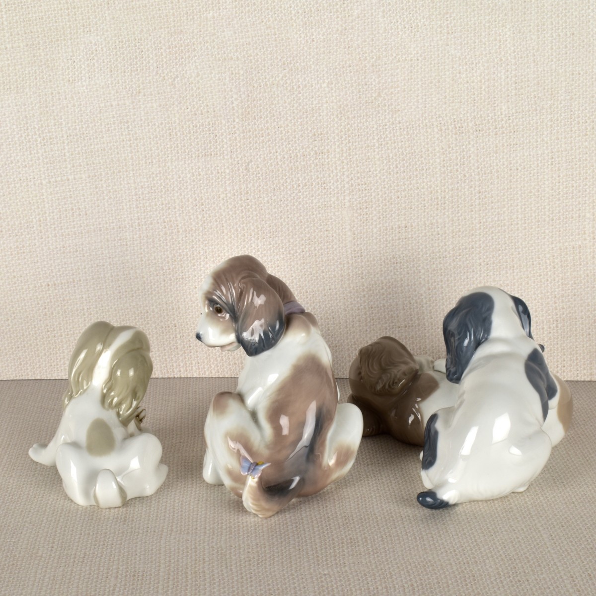 Three Lladro Porcelain Puppy Figurines