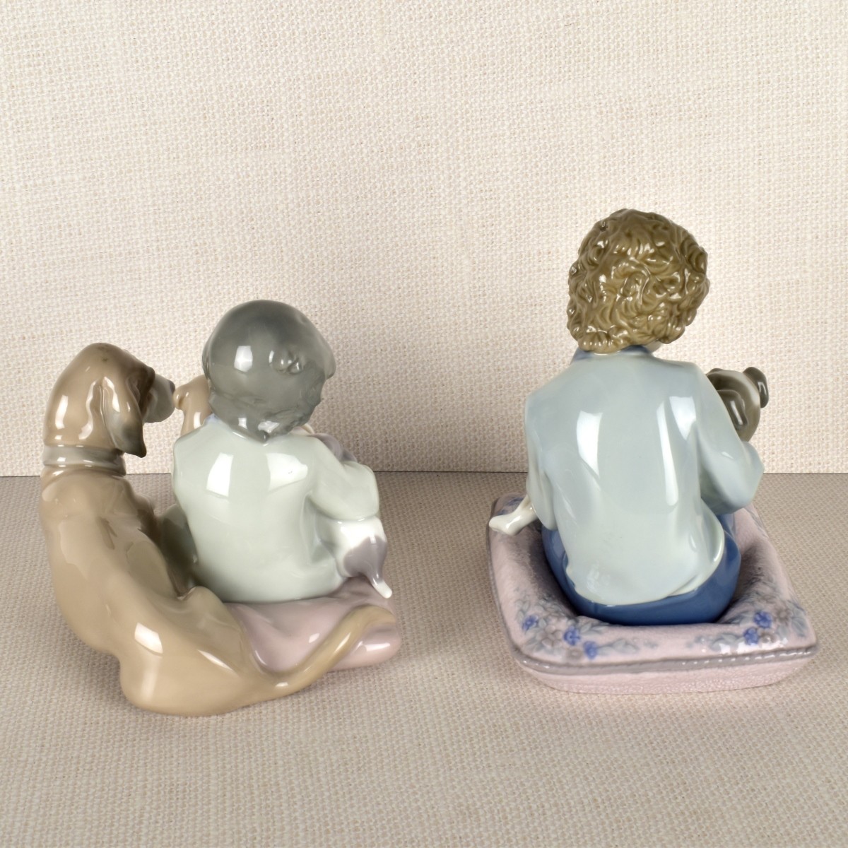 Two Lladro Porcelain Children with Dogs