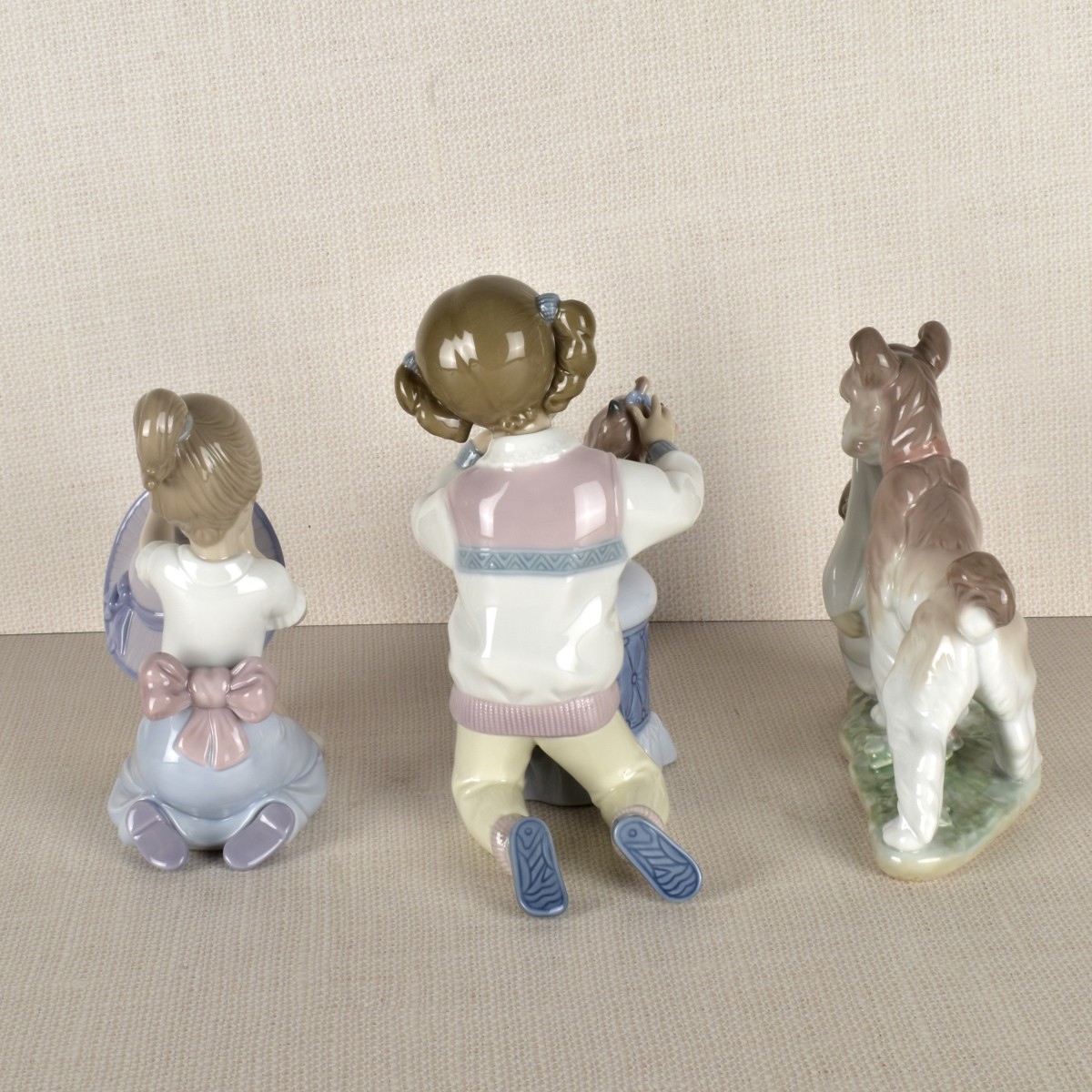 Three Lladro Figurines Children with Dogs.