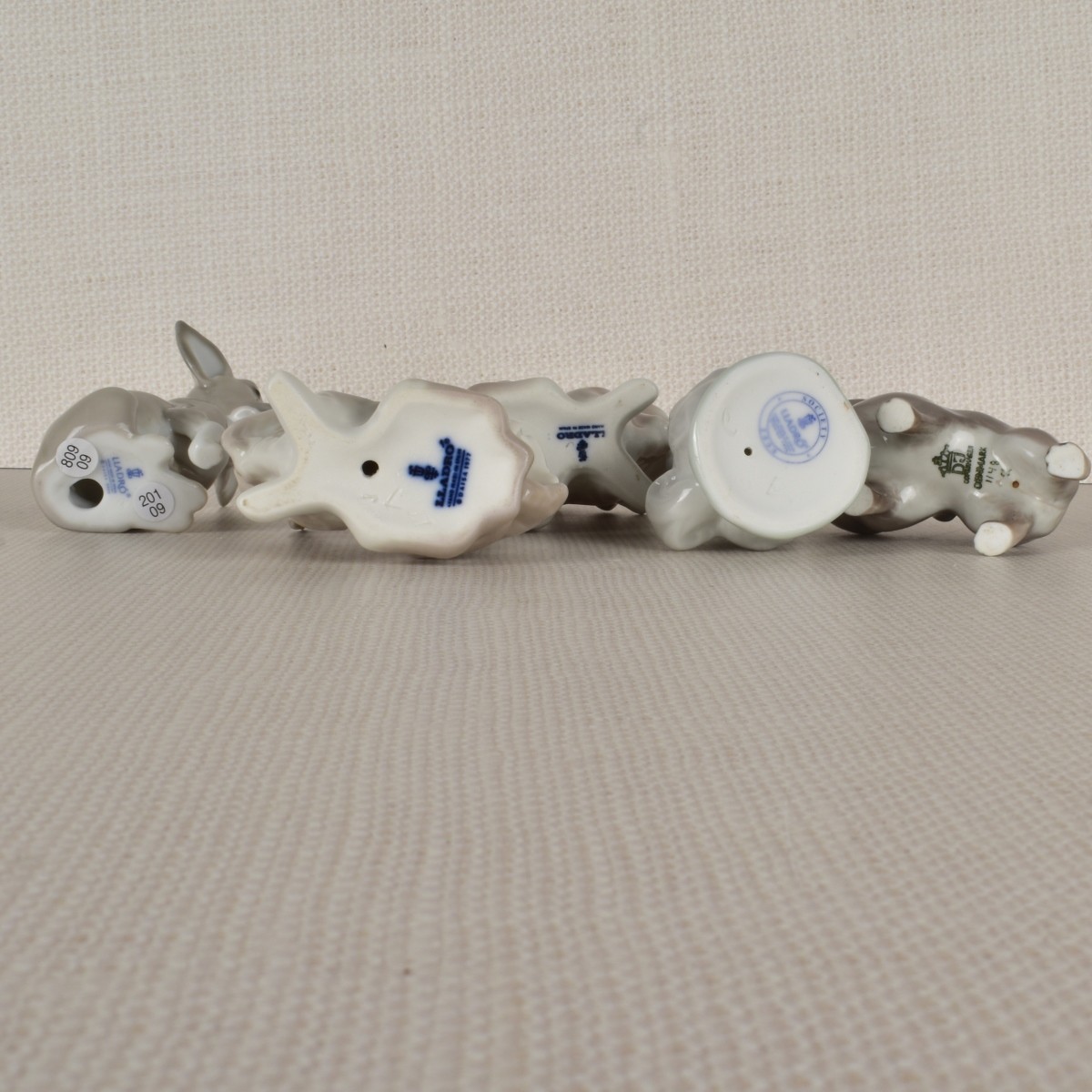 Six Porcelain Dog Figurines mostly Lladro