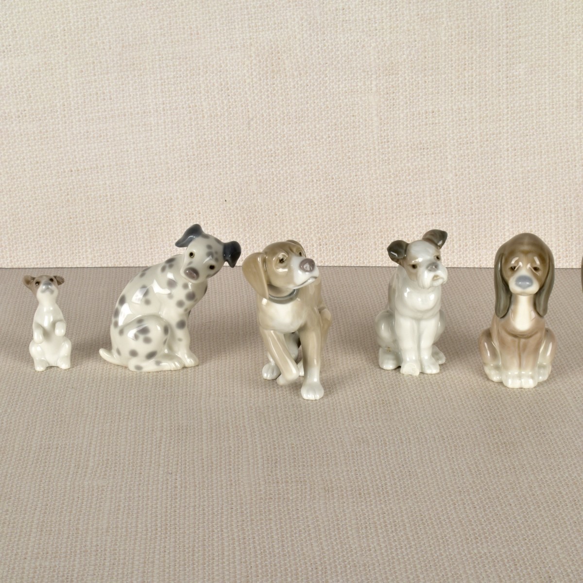 Five Lladro Porcelain Dog Figurines