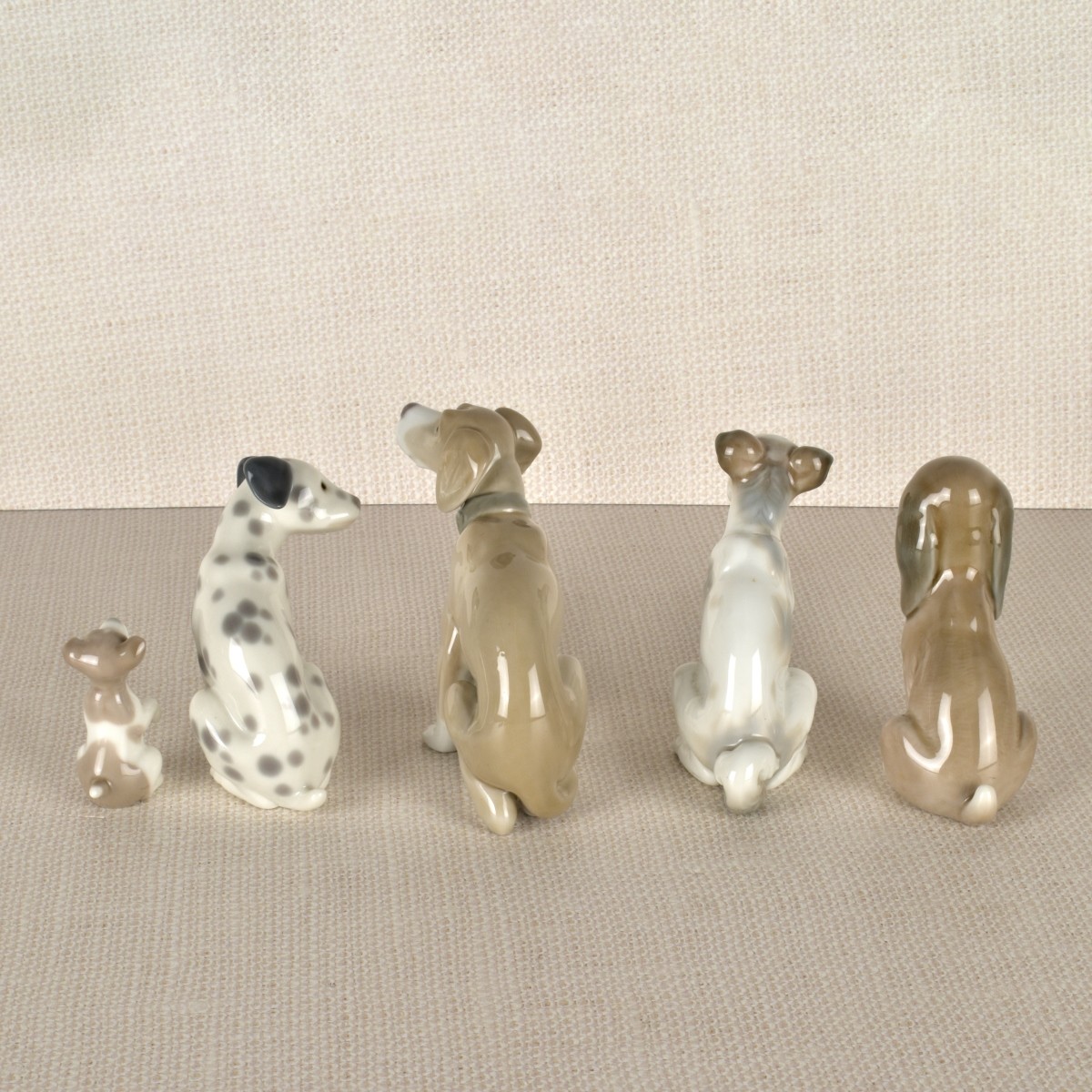 Five Lladro Porcelain Dog Figurines