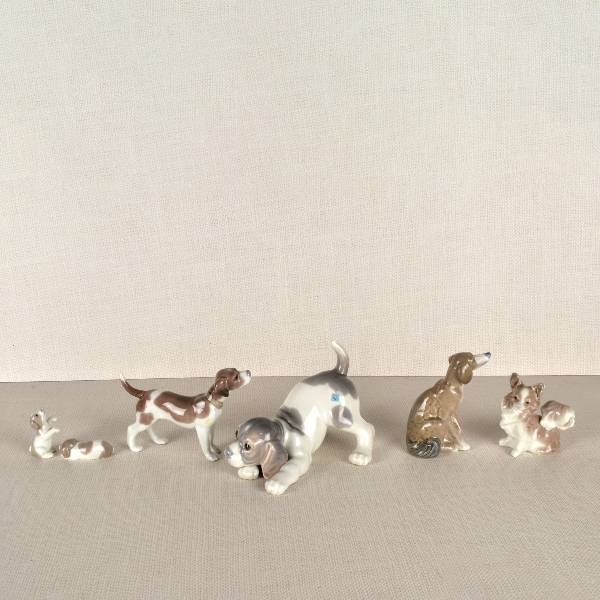 Six Lladro Porcelain Dog Figurines
