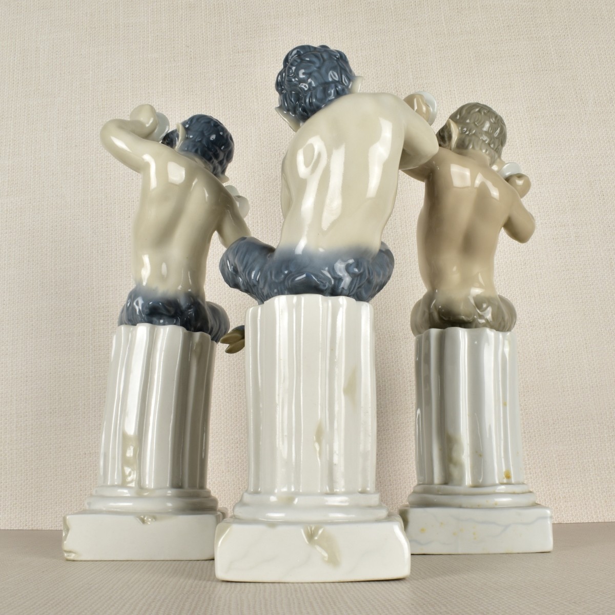 Three Lladro Satyr / Pan Porcelain Figurines