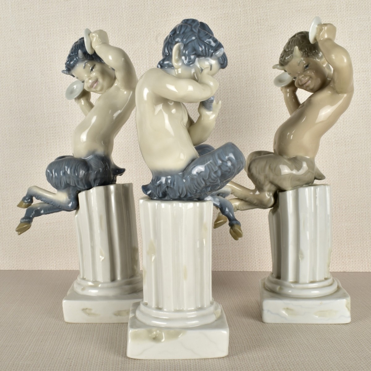 Three Lladro Satyr / Pan Porcelain Figurines