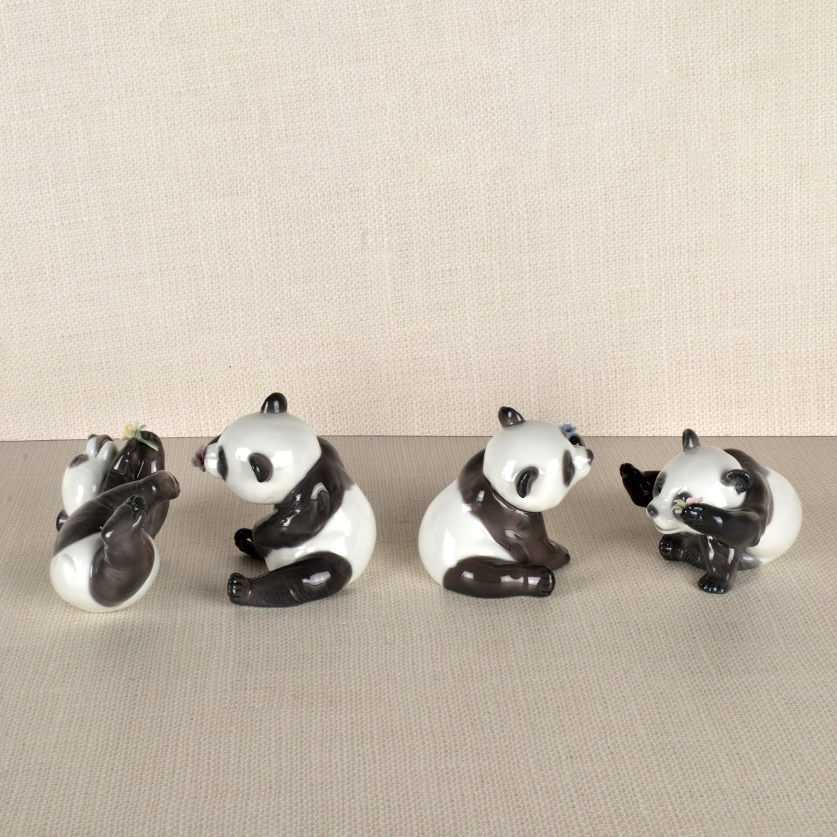 Four Lladro Porcelain Panda Figurines