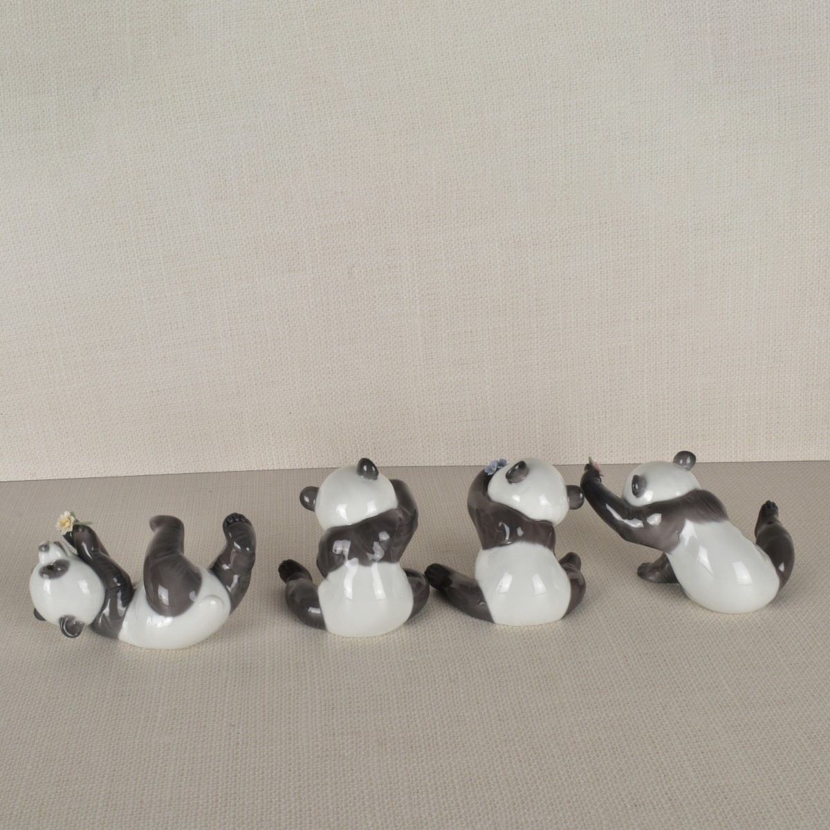 Four Lladro Porcelain Panda Figurines