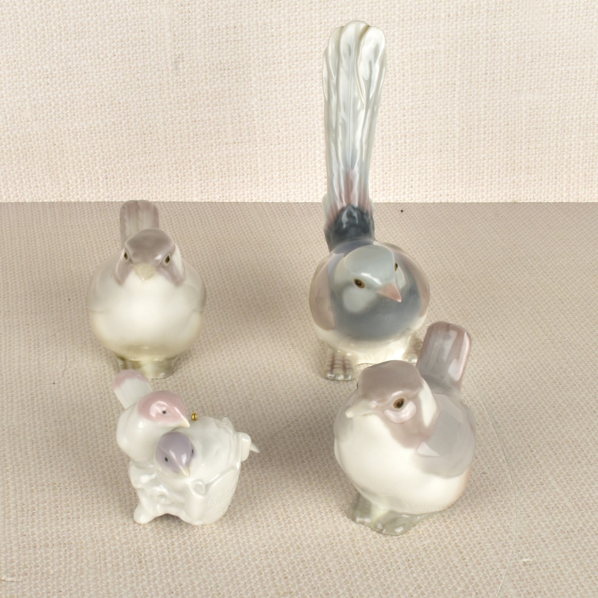 Four Lladro Porcelain Bird Figurines