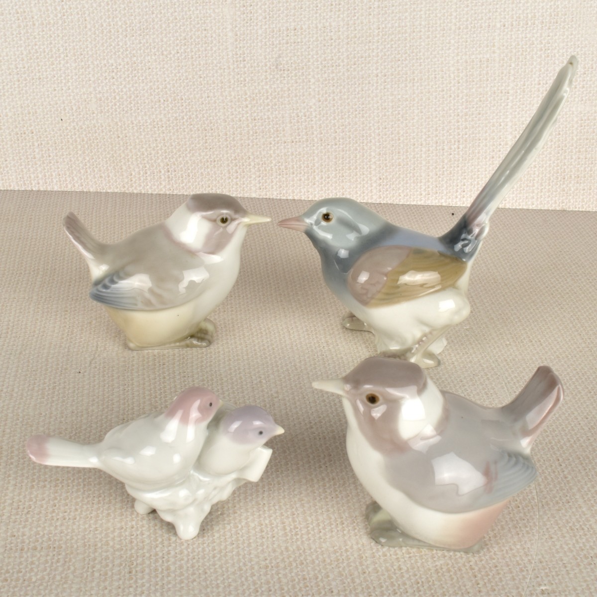 Four Lladro Porcelain Bird Figurines