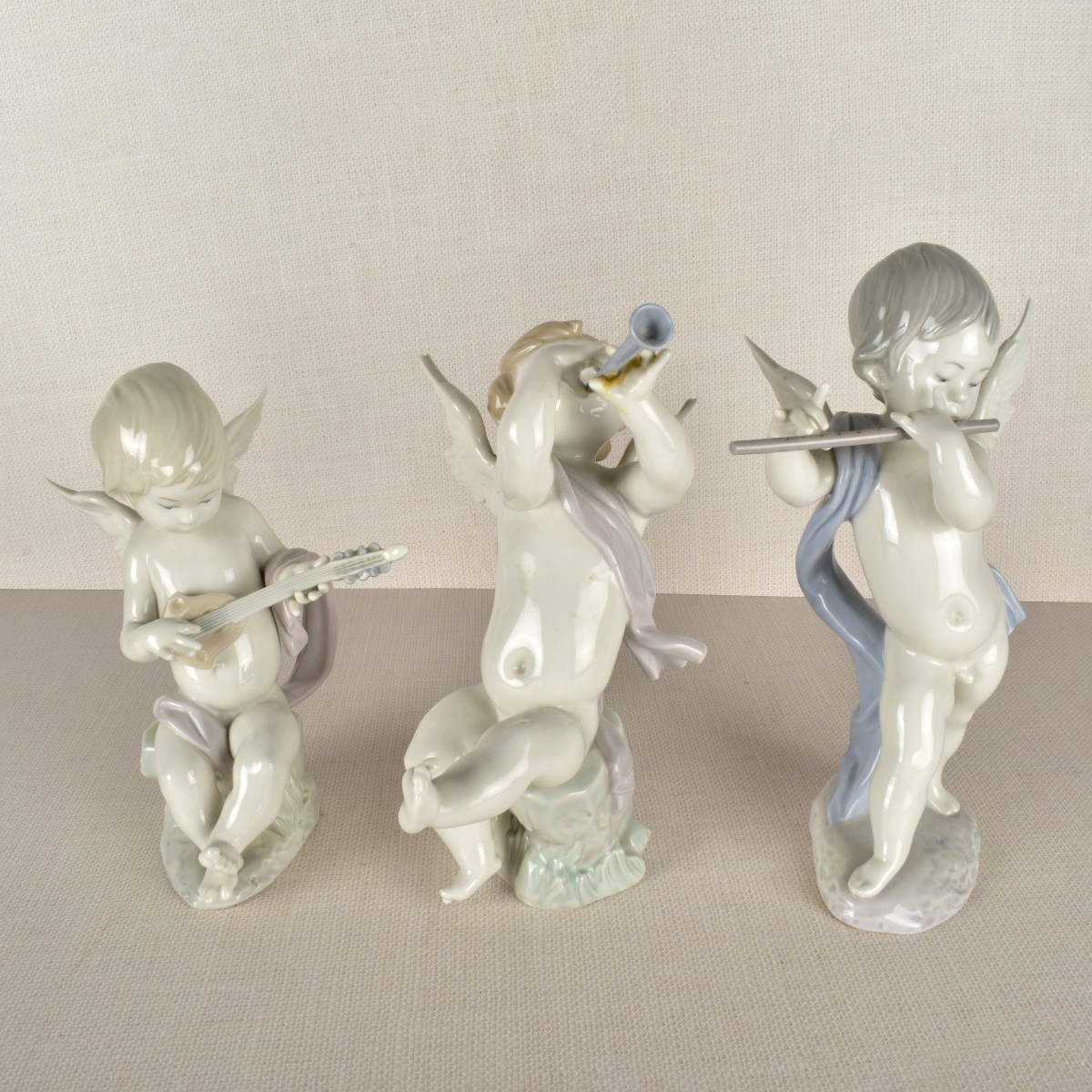 Lladro Cupid Figurines