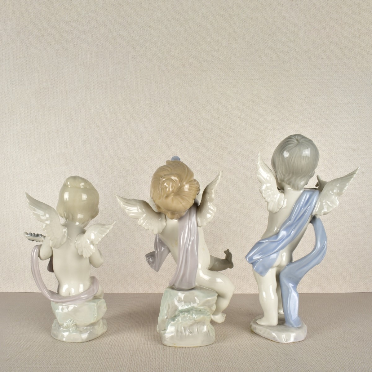 Lladro Cupid Figurines