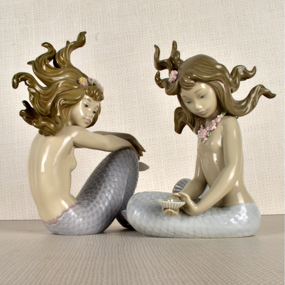Two (2) Lladro Porcelain Mermaids