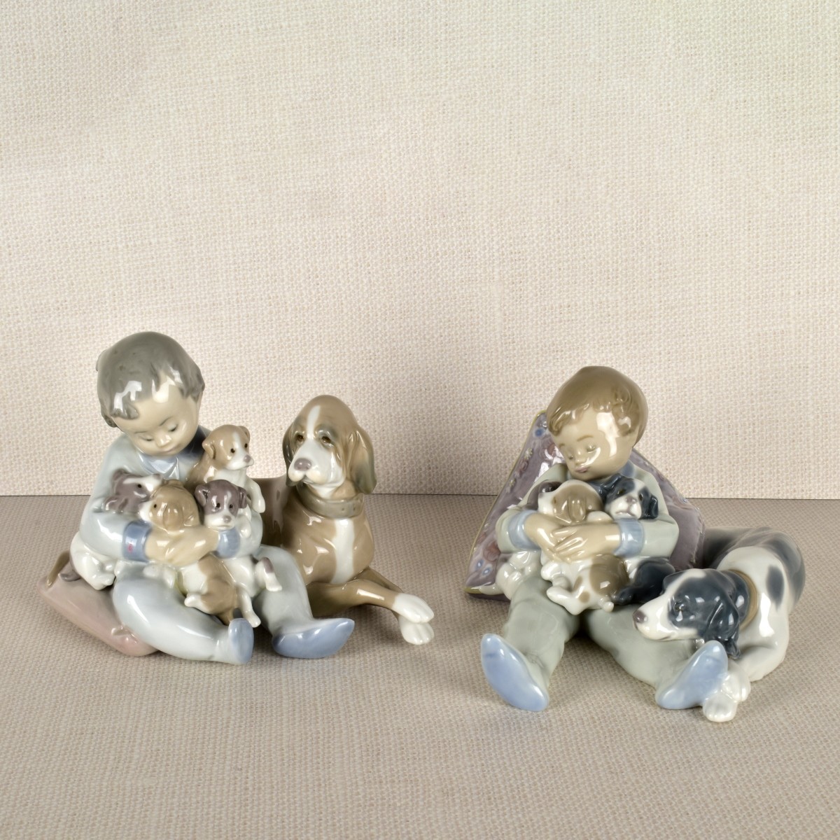 Two Lladro Porcelain Dogs with Children