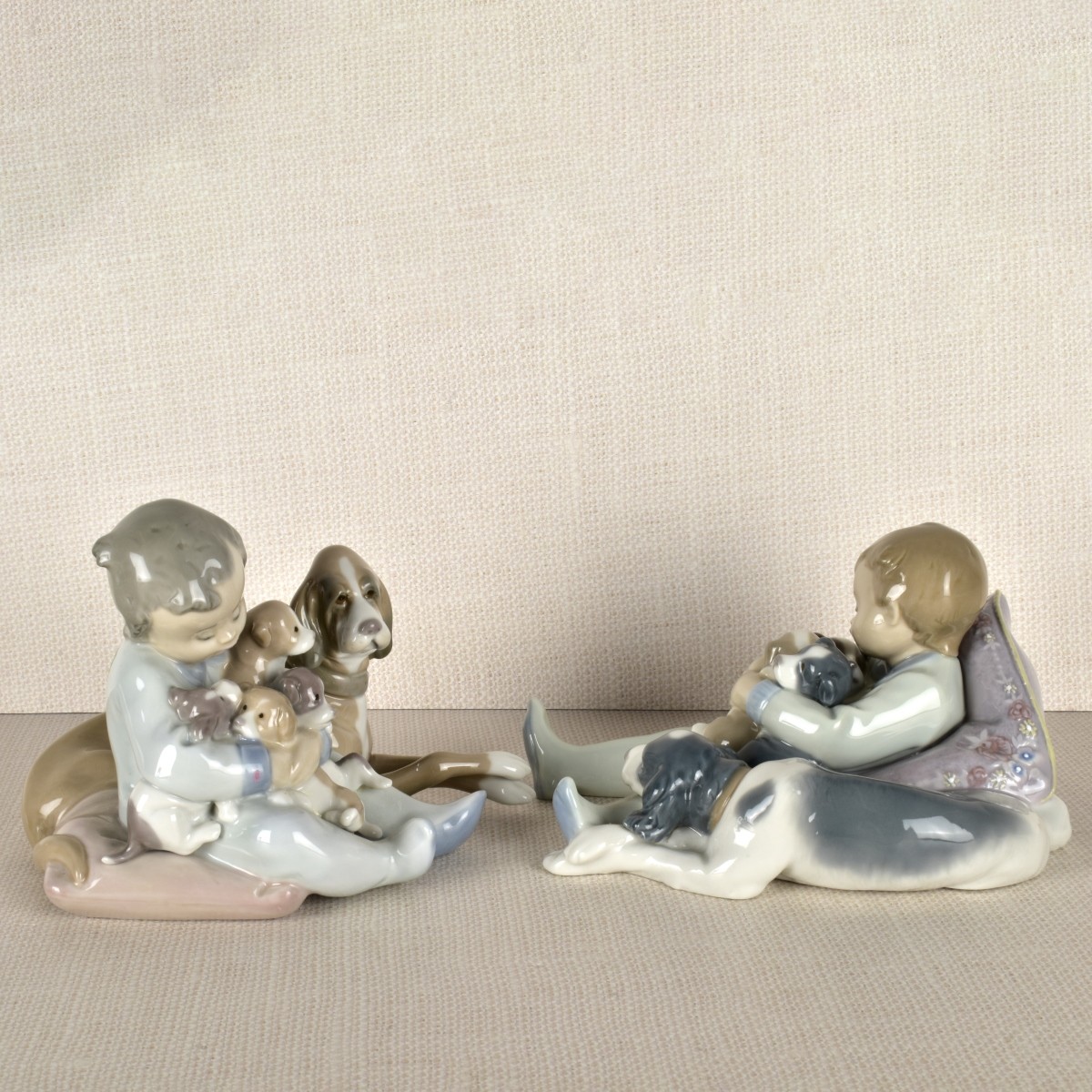 Two Lladro Porcelain Dogs with Children