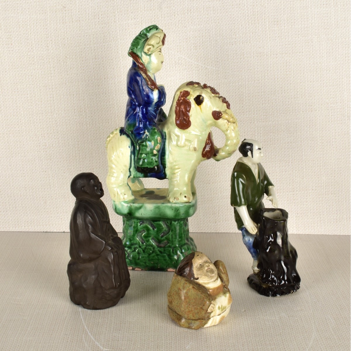 Four (4) Asian Porcelain Figures