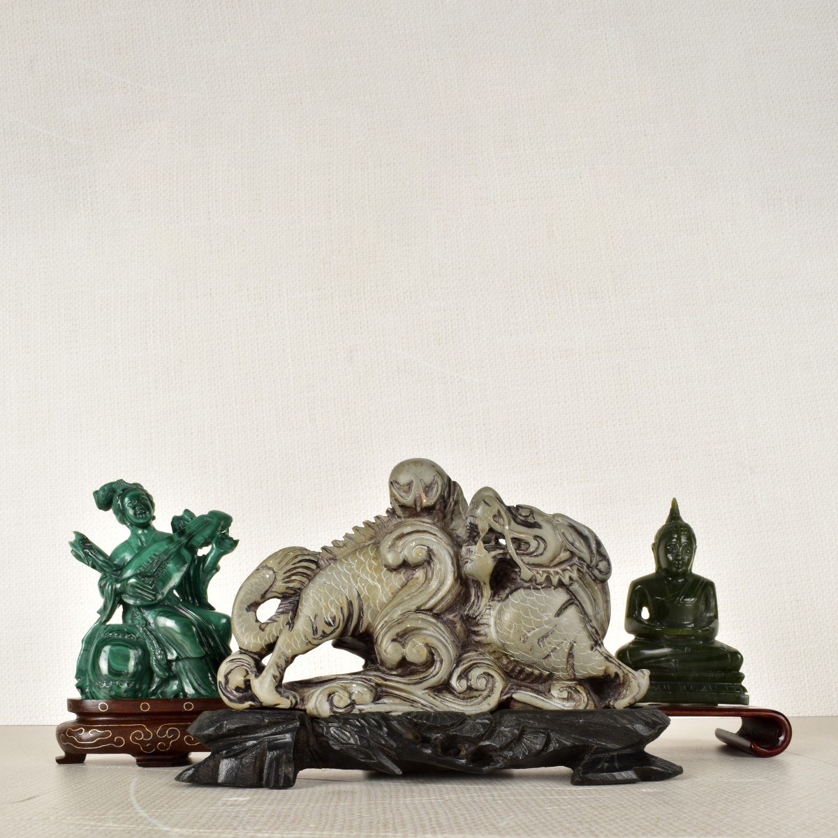 Three (3) Carved Asian Figures