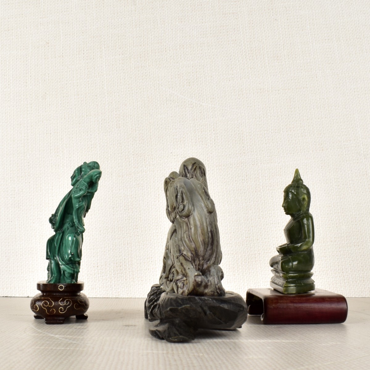 Three (3) Carved Asian Figures