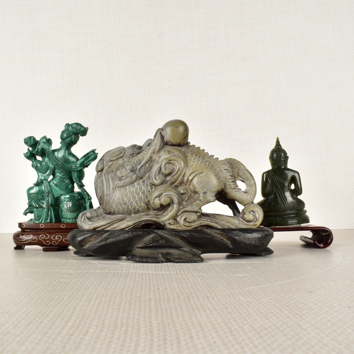 Three (3) Carved Asian Figures