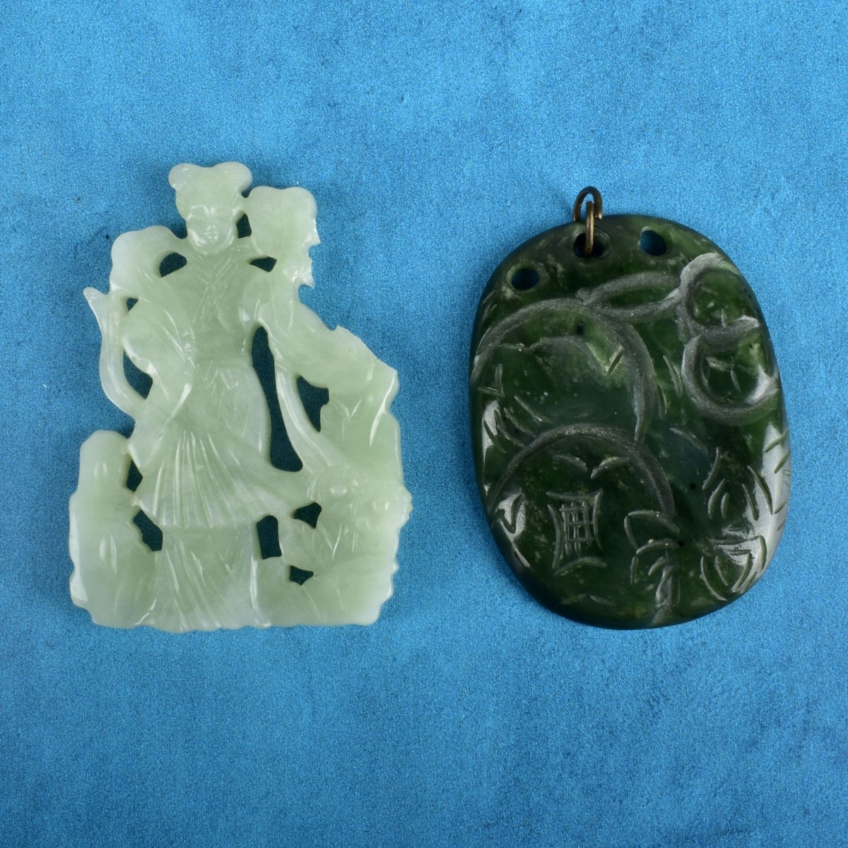 Two Chinese Carved Jade Pendants