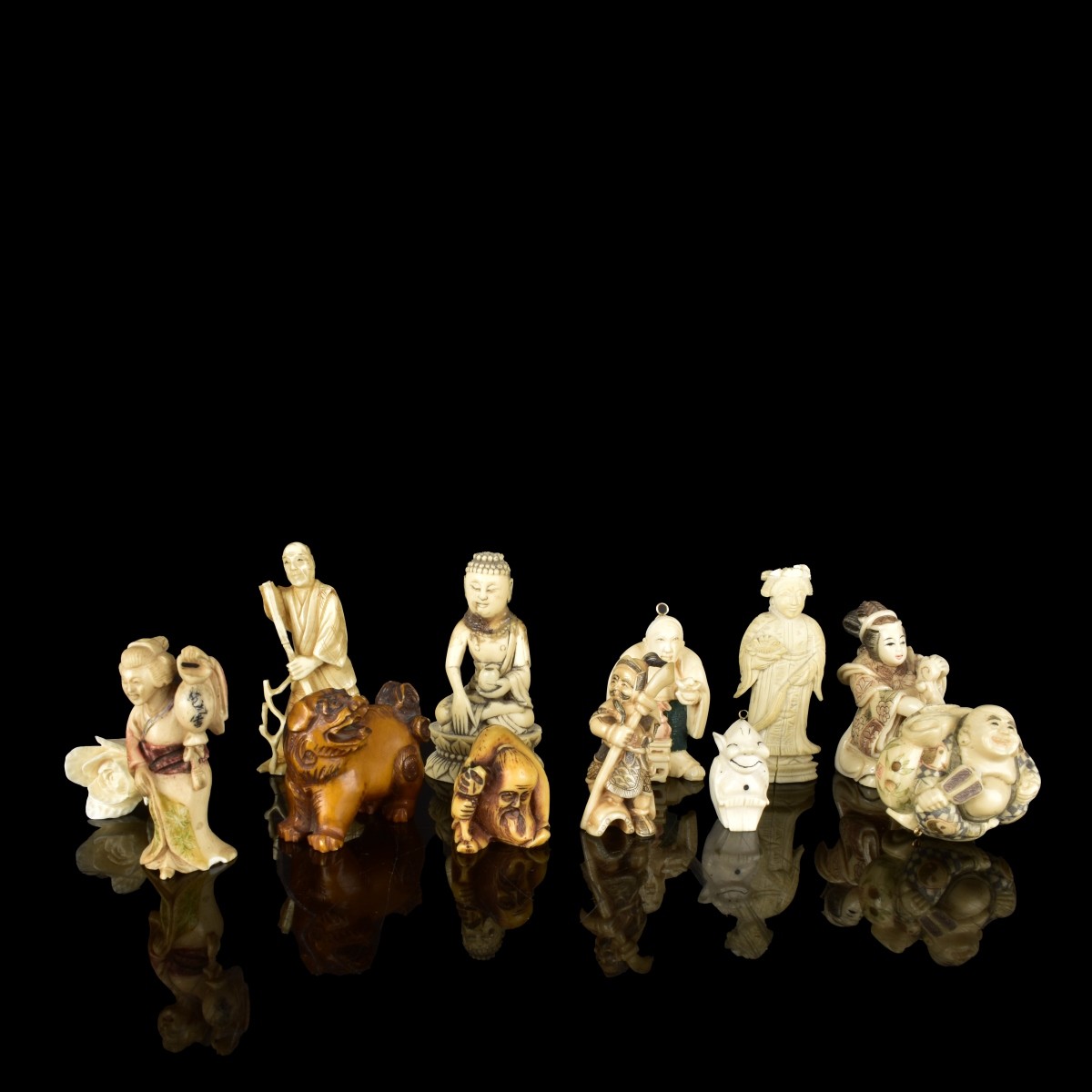 Twelve Asian Carved Figures