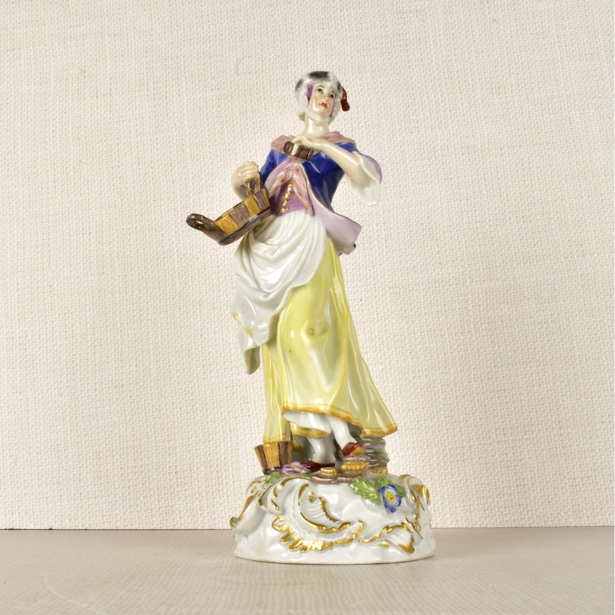 Meissen Figurine of Woman with a Basket