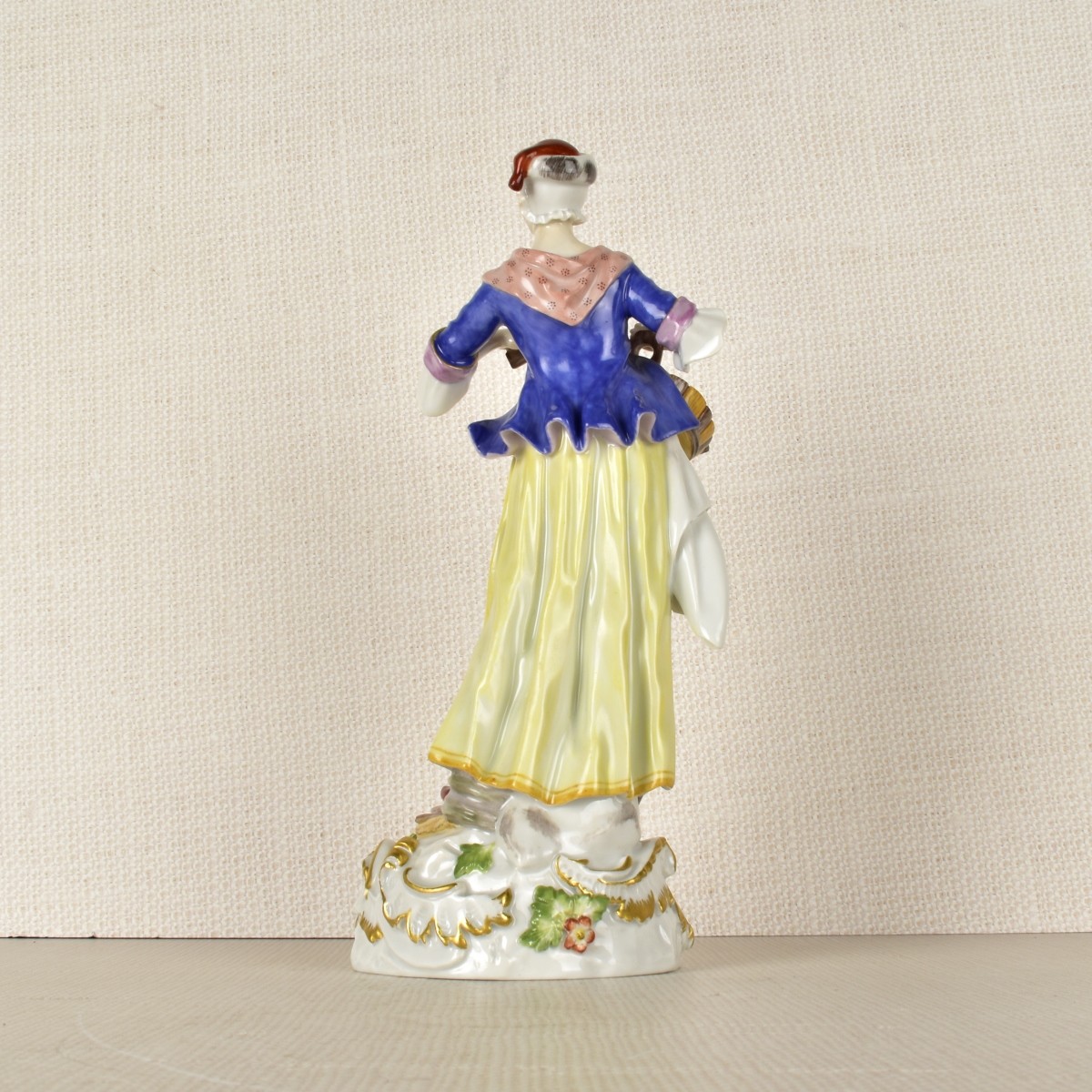 Meissen Figurine of Woman with a Basket