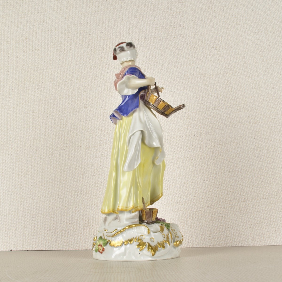 Meissen Figurine of Woman with a Basket