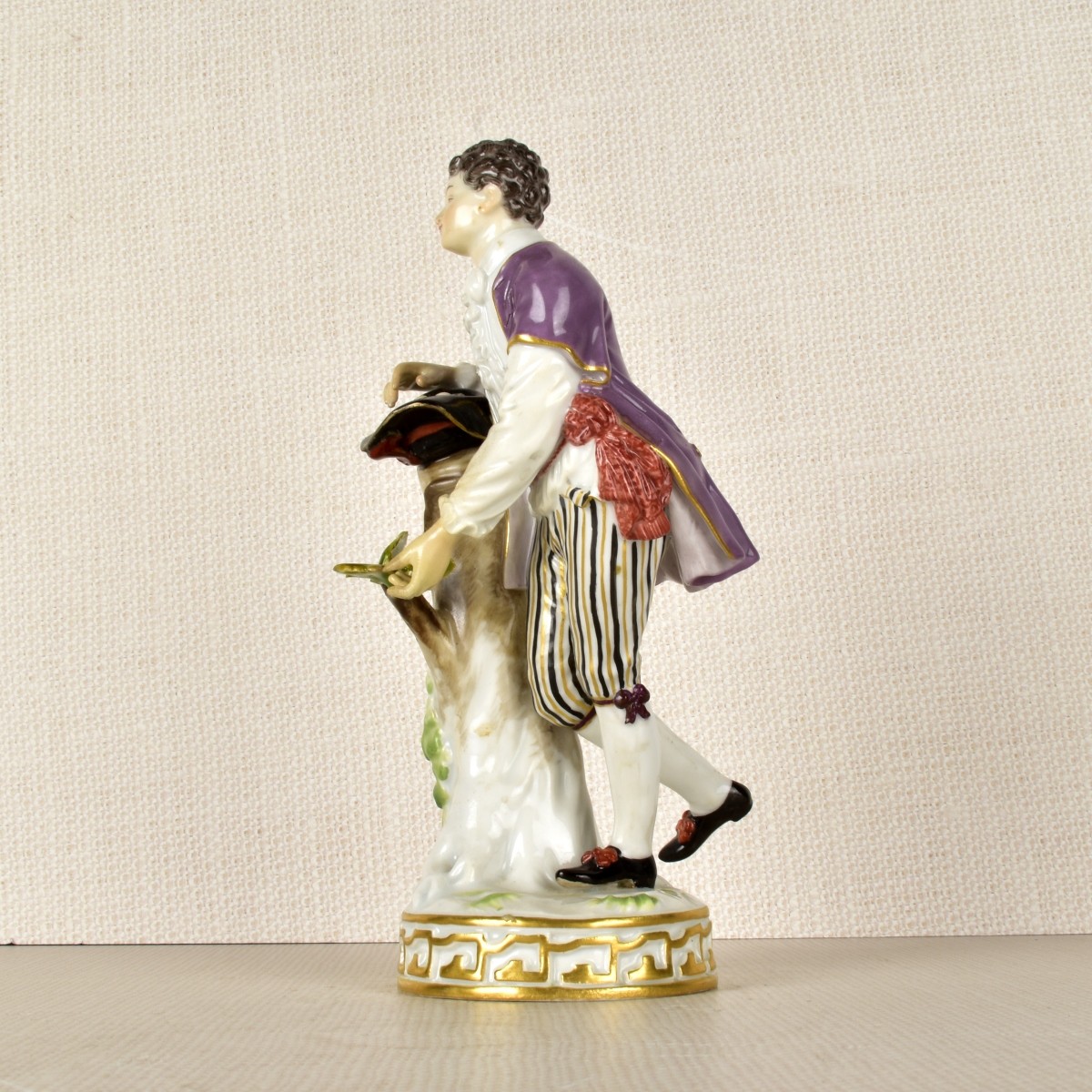 Meissen Figurine of a Boy Gathering Eggs