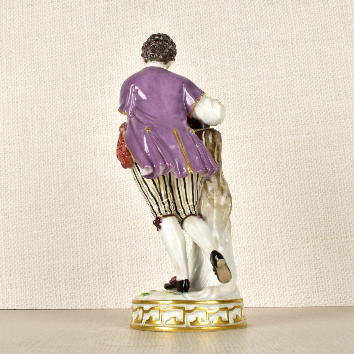 Meissen Figurine of a Boy Gathering Eggs