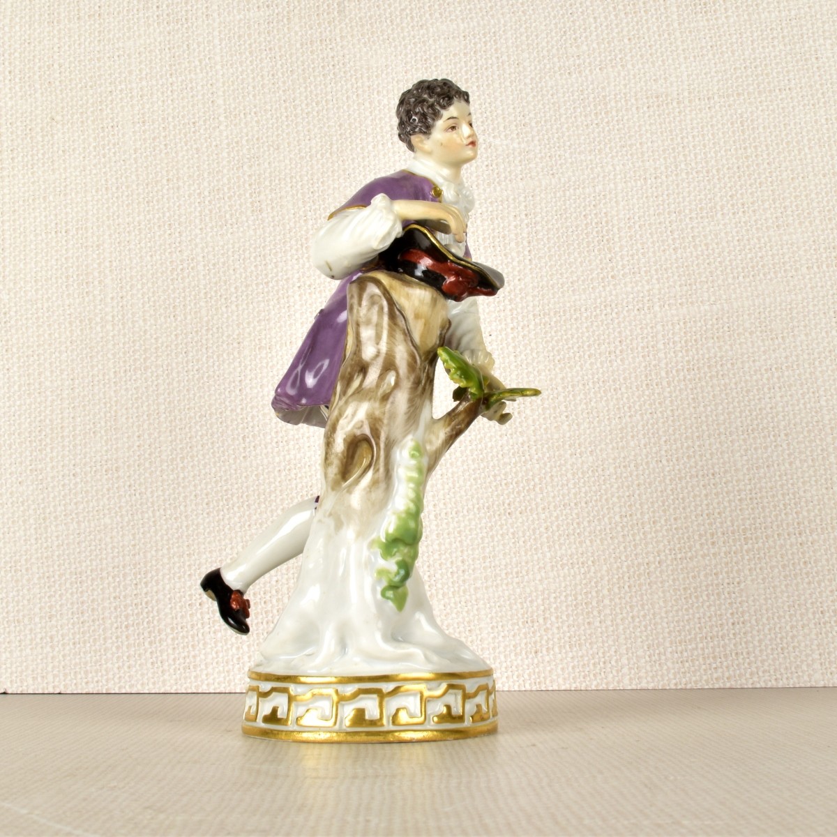 Meissen Figurine of a Boy Gathering Eggs