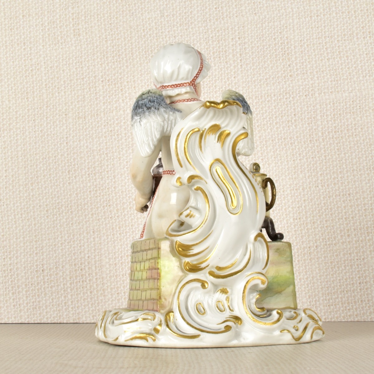 Meissen Figurine of a Young Boy Grinding Coffee