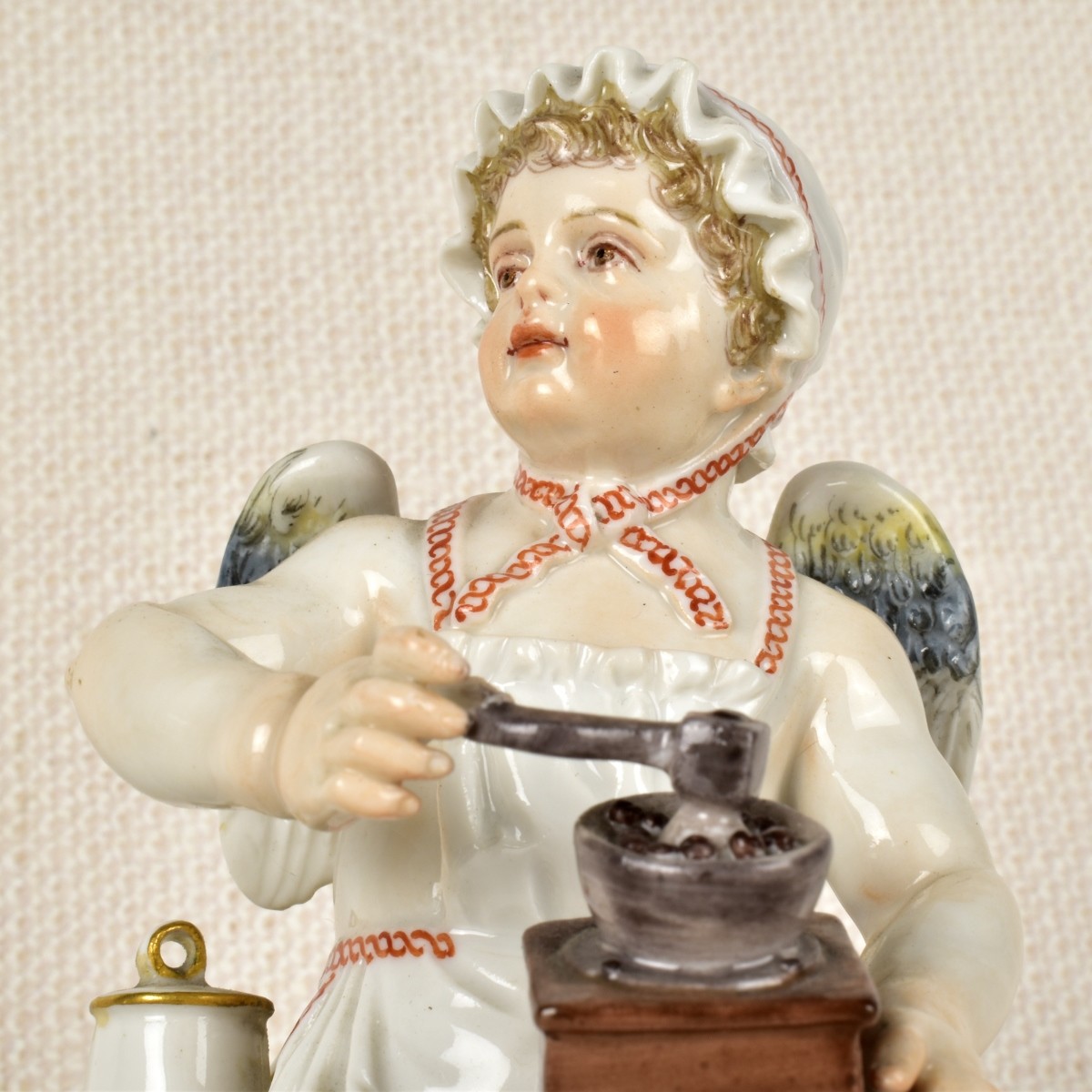 Meissen Figurine of a Young Boy Grinding Coffee