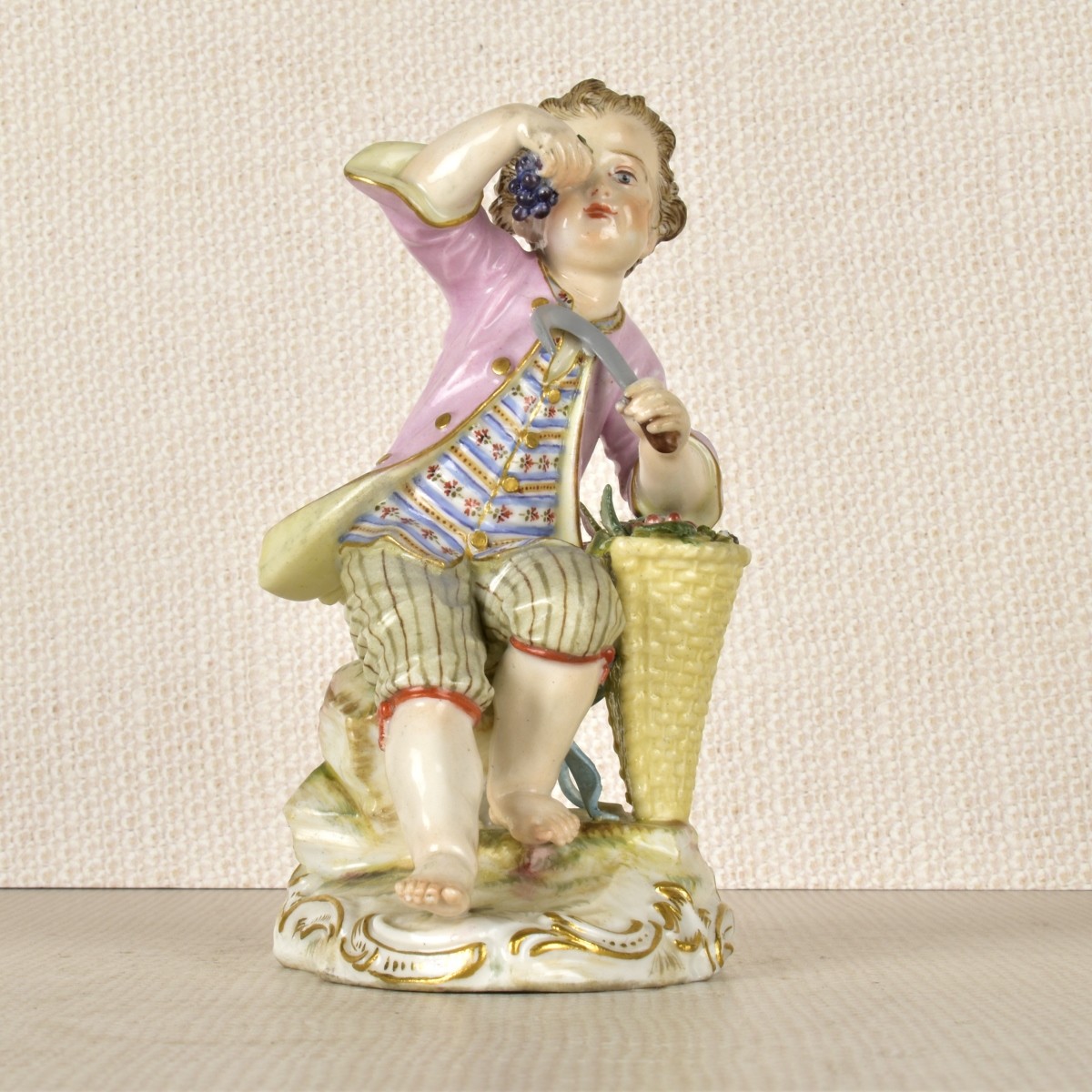 Meissen Porcelain Figurine of a Boy with a Sickle