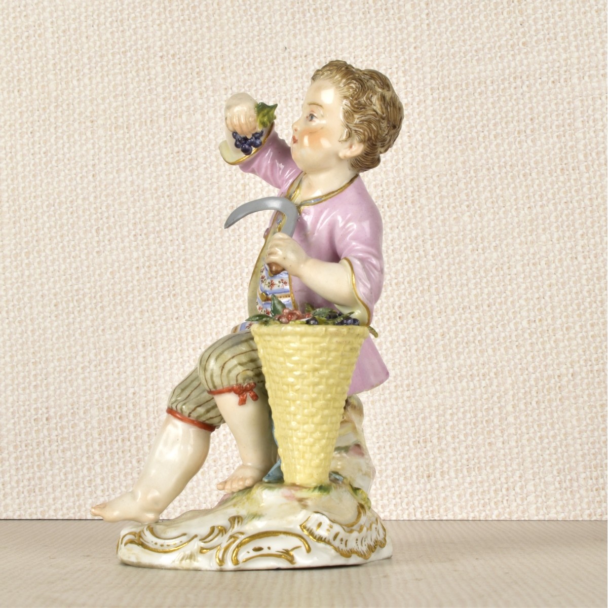 Meissen Porcelain Figurine of a Boy with a Sickle