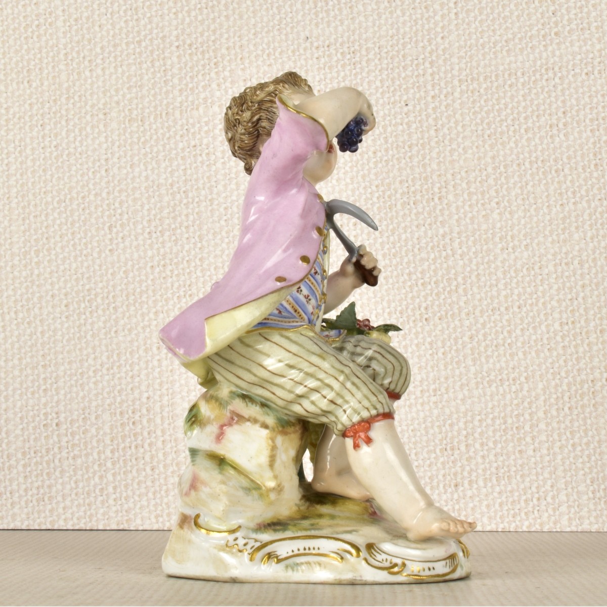 Meissen Porcelain Figurine of a Boy with a Sickle