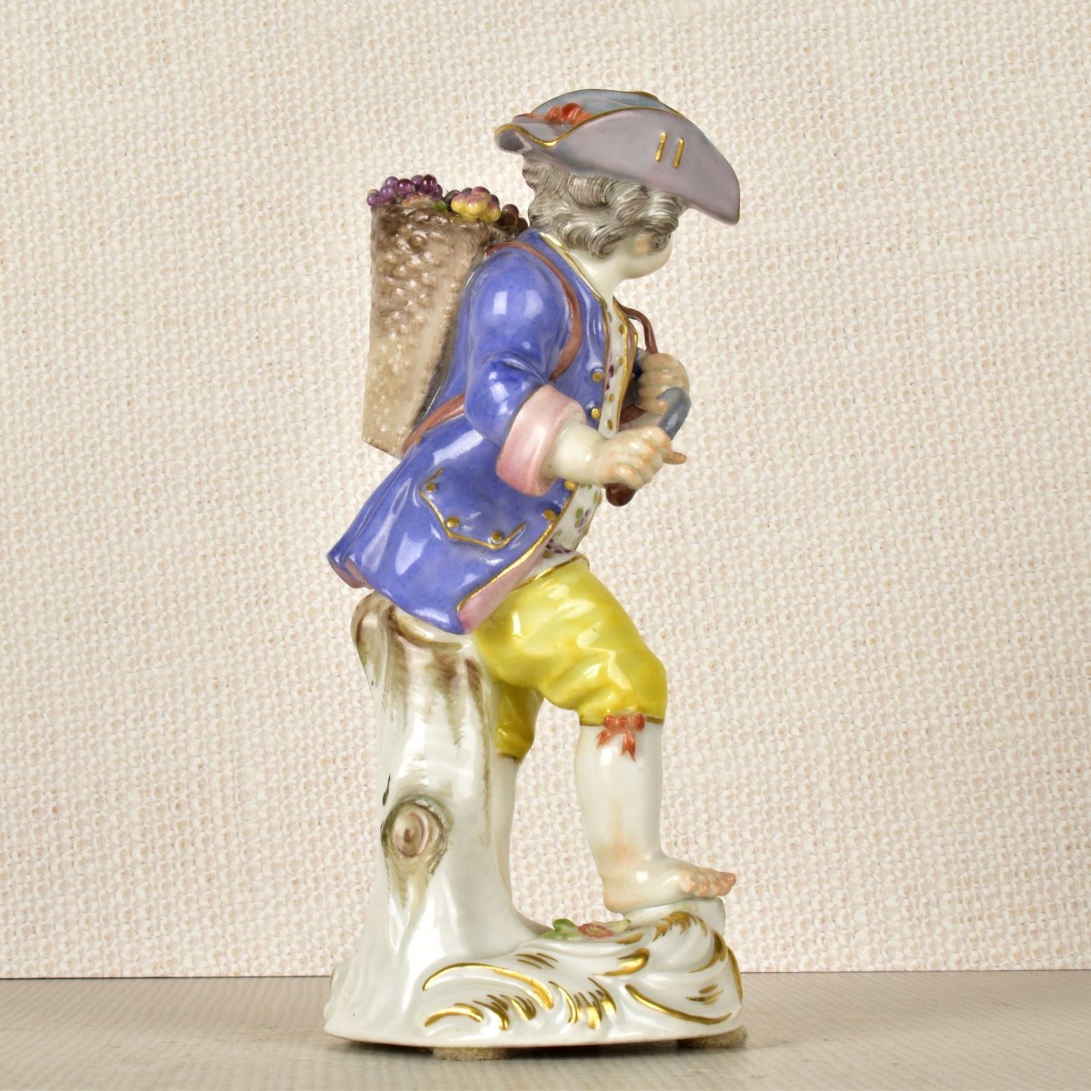 Meissen Porcelain Figurine of a Boy with Flowers