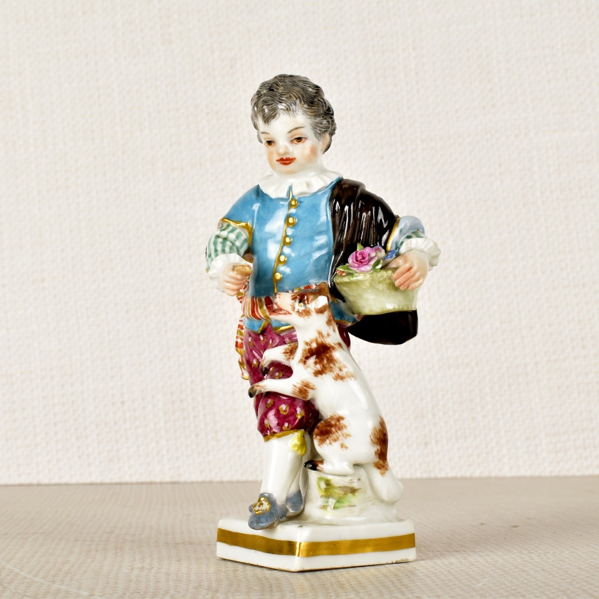 Meissen Porcelain Figurine of a Young Boy and Dog