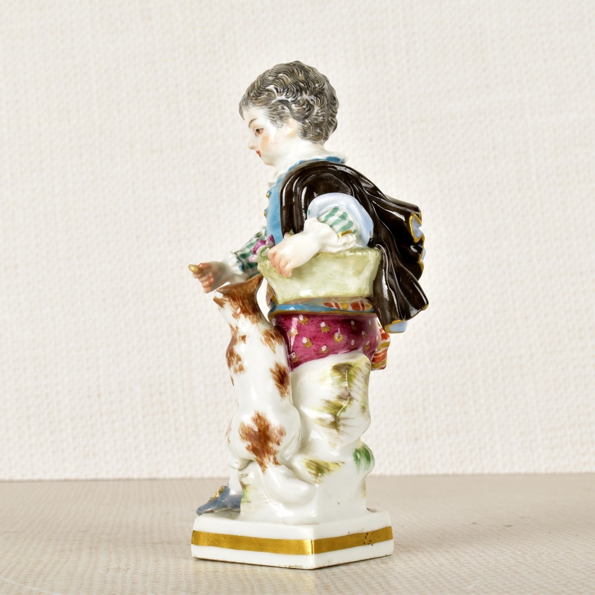 Meissen Porcelain Figurine of a Young Boy and Dog