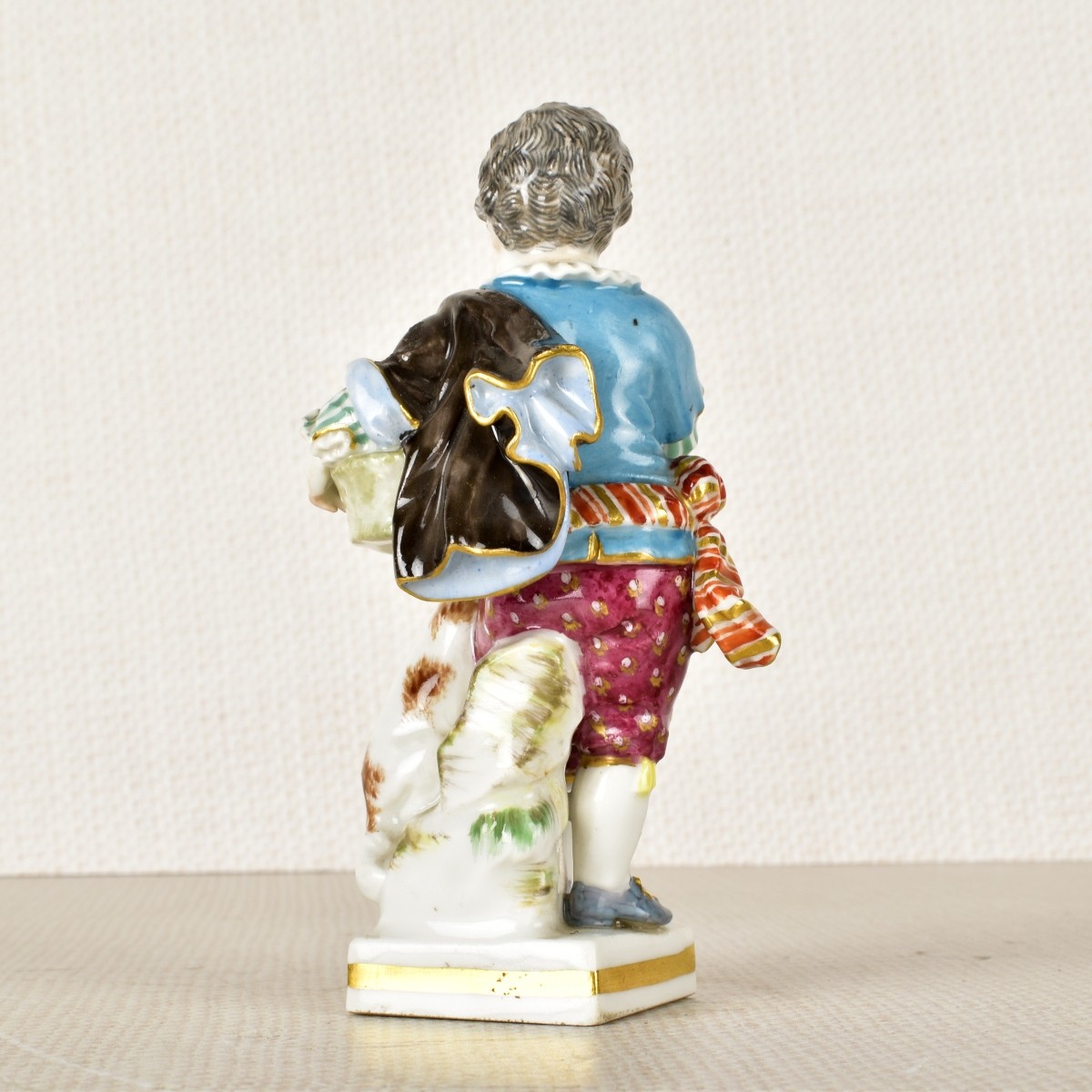 Meissen Porcelain Figurine of a Young Boy and Dog