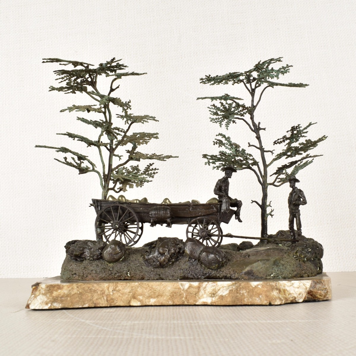 Bronze Sculpture of a Wagon and Gold Diggers