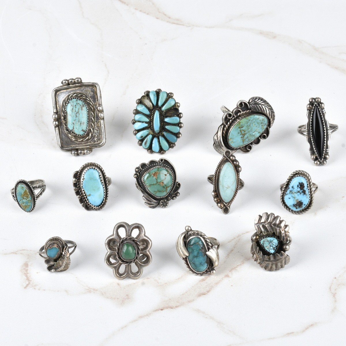 Turquoise and Black Onyx Mounted in Silver Rings