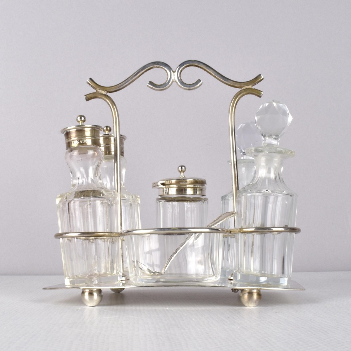 Silverplate Condiment Set and a Biscuit Jar