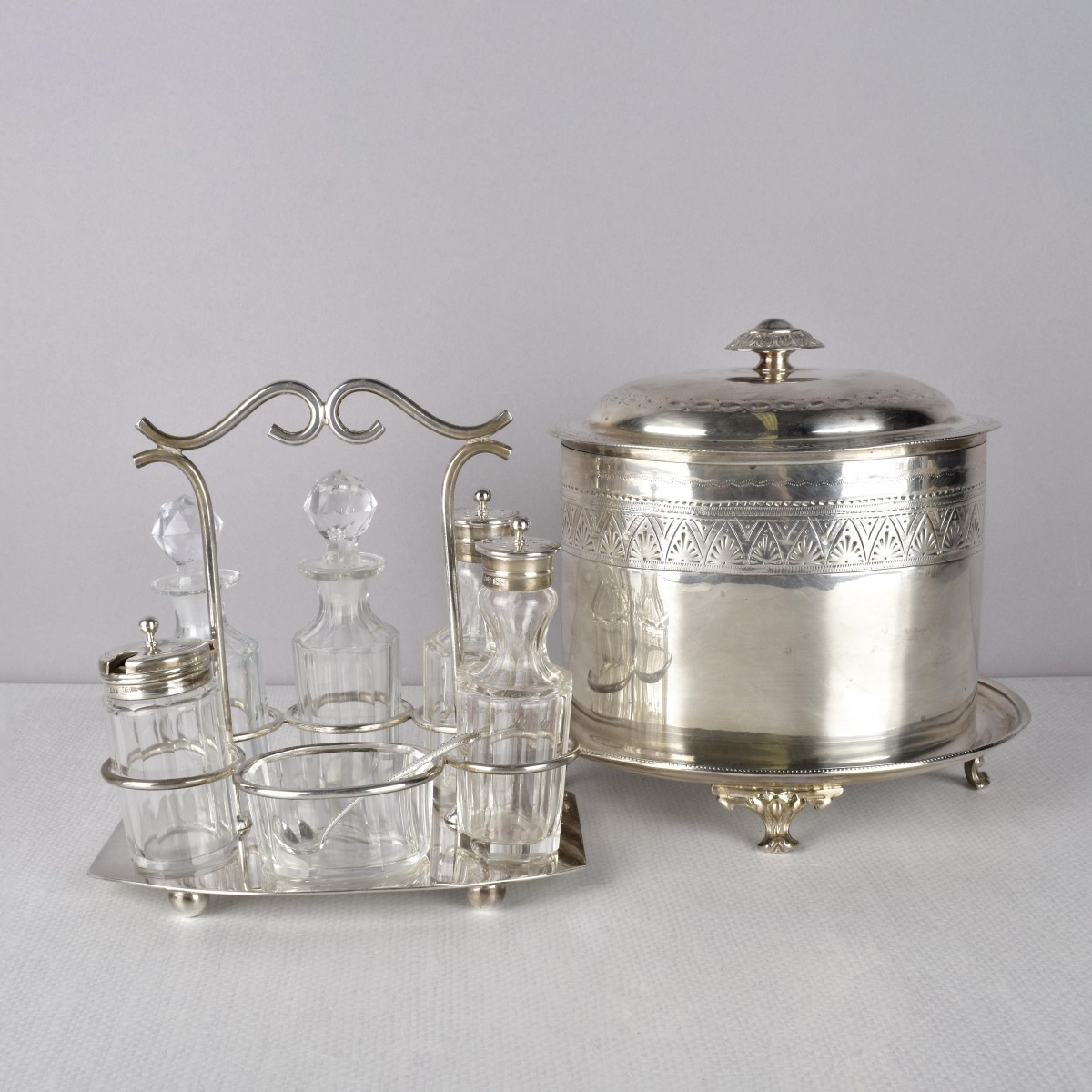 Silverplate Condiment Set and a Biscuit Jar